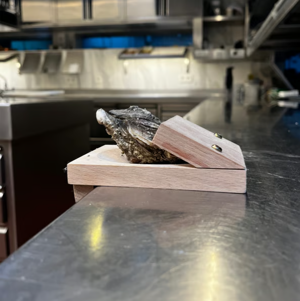 Oyster-skrapeklemme
