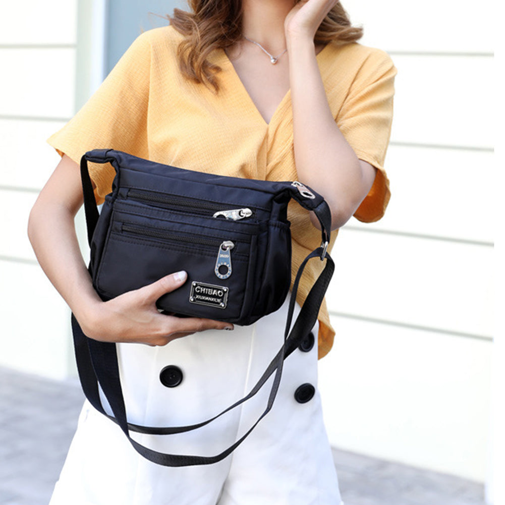 🔥🎁Vattentät Crossbody-väska Dam Casual Messenger Axelväskor Handväska för resor dagligen