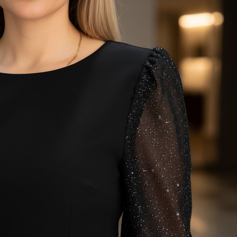 Elegant damklänning med paljettdekoration